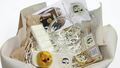 Luxury gift box featuring a 13x11cm glass wax melts burner and two packs of handmade soy wax melts by Gzen Candles.