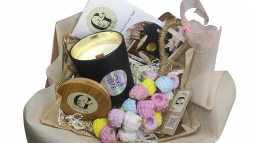 Luxury aromatherapy gift box featuring a large 400g black soy candle and a colorful hanging grape soap on a rope by Gzen Candles.