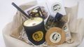 Luxury gift set featuring a large 400g black soy candle with a wooden wick and a 200ml glass reed diffuser with black sticks by Gzen Candles.