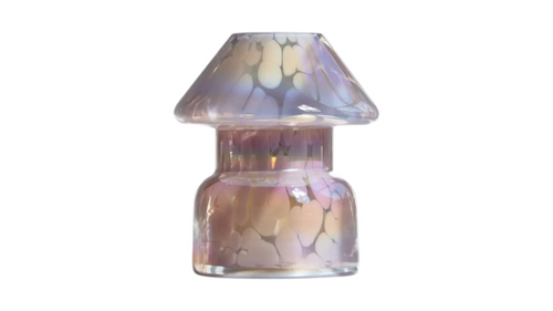An iridescent glass insulator with a conical top and cylindrical base, featuring a shimmering purple, pink, and gold pattern on a white background. A beautiful mushroom shape jar with candle by Gzen . Lamp jar