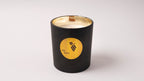 Black jar soy candle with wood wick and a gold logo of gzencandles on a white background. Handmade in Cyprus this wood wick soy candle smells like frered grapes 
Χειροποίητο αρωματικο κερί από σόγια με ξύλινο φυτιλι και άρωμα κόκκινο σταφύλι από αντιαλεργικα και οικολογικά αρώματα. Φτιαγμένο στη Κύπρο 