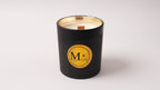 Black jar soy scented candle with gold and wood lid and logo of gzencandles on a white background. Handmade in Cyprus made with Eco-Friendly and hypoallergenic fragrance by Gzen. Scent white musk 