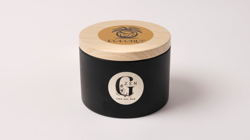 Black metal container with lid featuring a logo of gzen candles on a white background